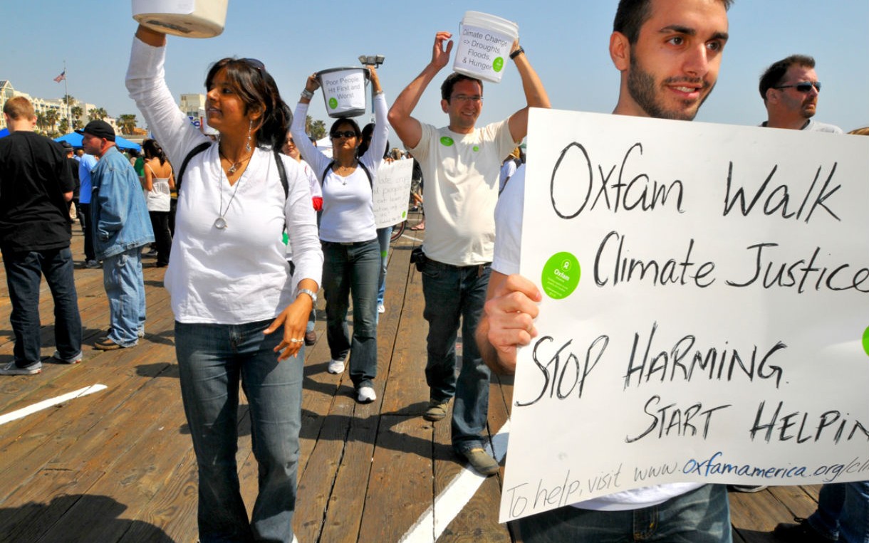 Oxfam volunteers take part in an Earth Day march to raise awareness about climate change. Photo: Liliana Rodriguez/Oxfam America