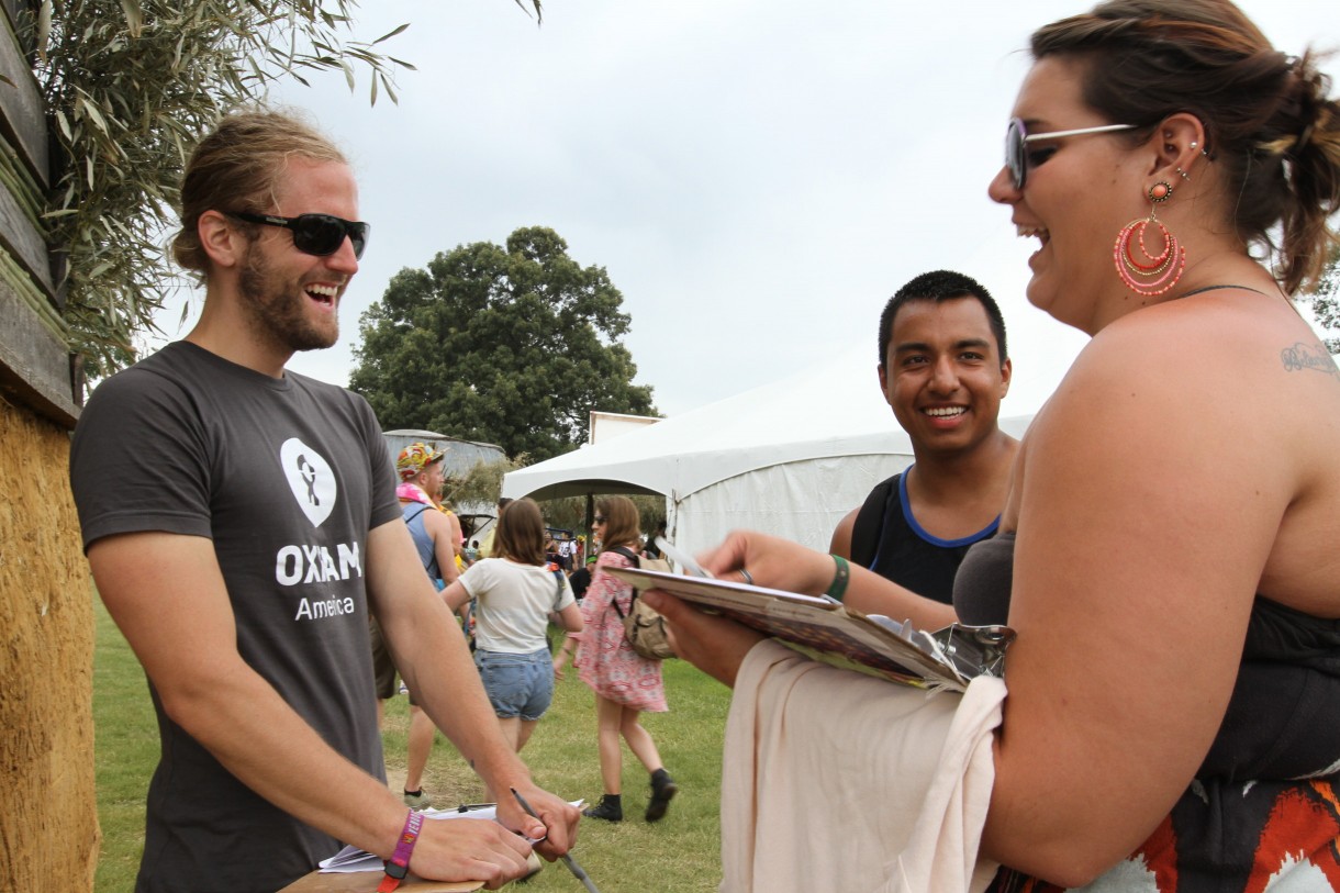 Oxfam volunteer Paul Gallegos, left, at the Bonnaroo Music Festival in Tennessee. Photo: Coco McCabe/Oxfam America