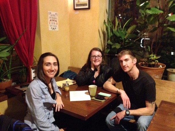 Ben Wiselogole, right, meets with fellow volunteers.