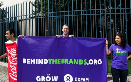 Oxfam volunteer Khaled Hamadh (left) stands with staff members Jon Scanlon (center) and Rebecca Rewald (right) in front of Coca-Cola world headquarters during a World Food Day media event in Atlanta, Georgia last year. Photo: Keith Lane / Oxfam America
