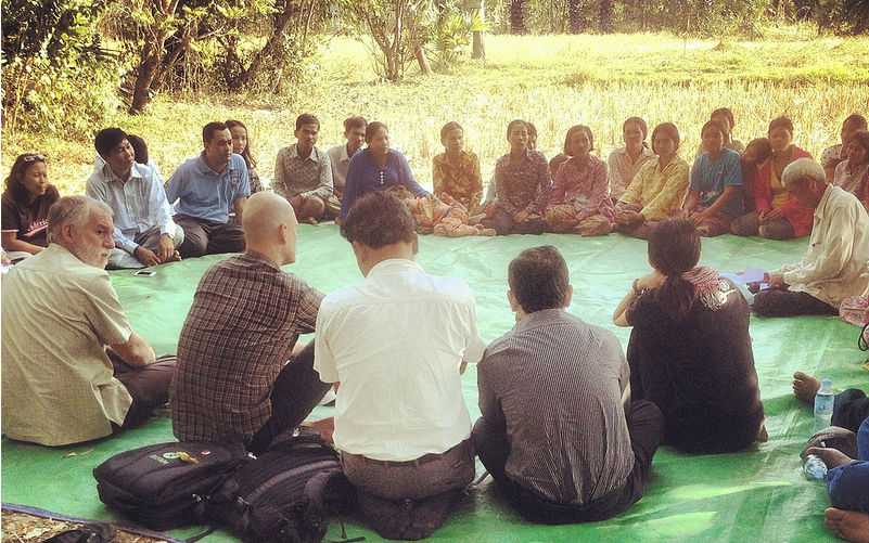 Oxfam staff and partners met last month with farmers in Cambodia who are using the system of rice intensification. Photo: Gawain Kripke / Oxfam