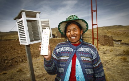 Ricardina Sune Llasa holds a thermometer used at a weather station in the Peruvian highlands. Oxfam America has been supporting rural indigenous people in the mountainous region of Espinar, Peru to become more resilient in the face of rainfall shortages, extreme cold, and other life-threatening consequences of climate change. From 2009-2012, Oxfam’s local partners worked with farmers in 22 communities to pilot reservoirs to conserve water, pressure-powered sprinkler irrigation systems, and hardier grasses for animals. The project also trained farmers to monitor weather data and to respond to climate-related emergencies. Photo: Percy Ramírez / Oxfam America