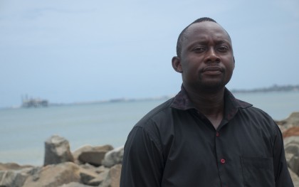 Kyei Kwadwo Yamoah is the Natural Resources Program Coordinator for Friends of the Nation (FON) in Ghana, which has been supporting local coastal communities to monitor environmental impacts of the oil industry, and advocate on behalf of fishing communities and others in the coastal areas. Friends of the Nation are one of 100 members of the Civil Society Oil Platform, an association that is advocating for transparent management of oil revenue. Here Yamoa is pictured off the coast of Sekondi and Takorade, in the Western Region of Ghana. Photo: Jeff Duetsch / Oxfam America