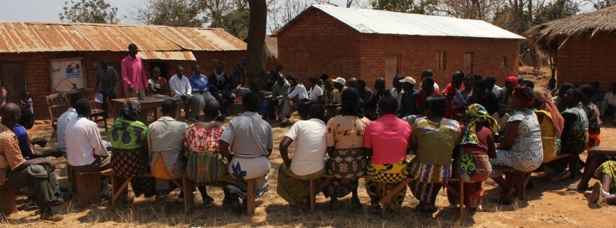 100 villagers and civic actors in the Mbeya region attend a meeting which revealed why the two local health dispensaries do not have any staff. Photo: Policy Forum